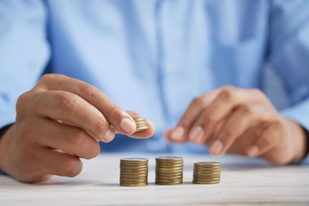 man staking coins